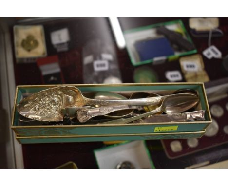 A quantity of various silver to include a berry spoon, cufflinks, medal, coins, and your last Rollo, gross weight 13 tr.oz. (