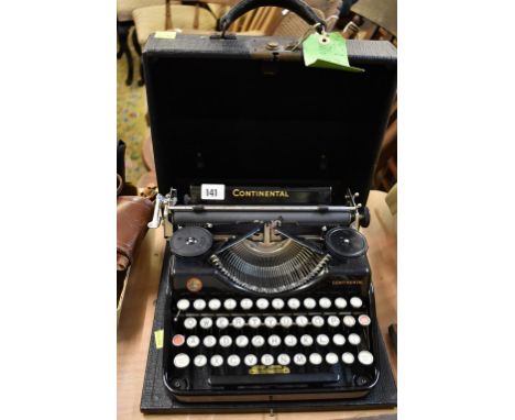 A vintage cased Continental typewriter.