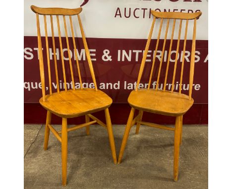 A pair of beech Ercol Goldsmith style side chairs 