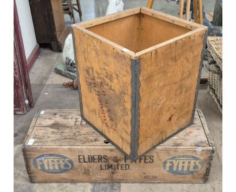 A vintage wooden banana crate and a tea chest 