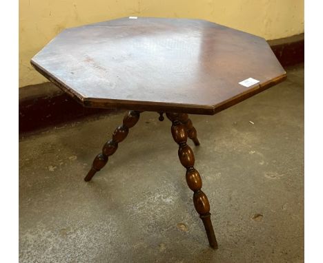 A Victorian walnut octagonal tripod occasional table 