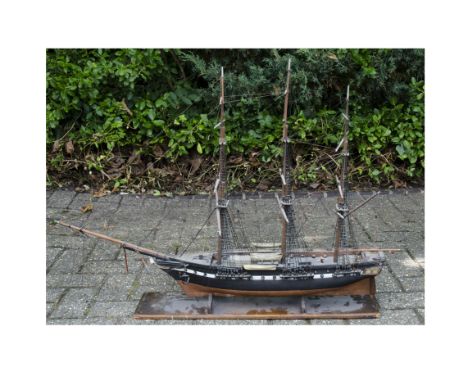 A large scale 3-Masted 'Man of War' Sailing Ship, constructed in wood with full rigging details, presented on a wooden plinth