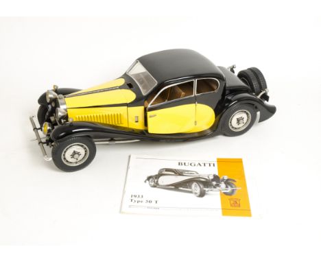 A Pocher kit built 1:8 scale Bugatti 1933 Type 50T, in black and yellow, with instructions and small box with unattached deta