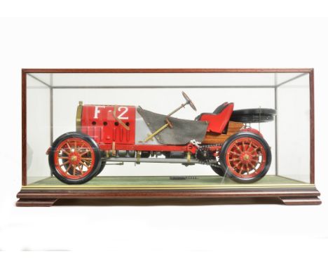 A Pocher kitbuilt 1:8 scale Fiat F2, in red and black, presented in a DSC glass/wood Showcase, VG, one chain loose 