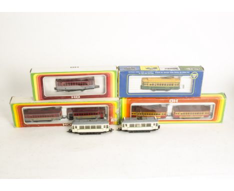 Hamo and Mehanotehnika HO Gauge Trams, an unboxed Hamo Motor car/Trailer set in cream/green, both with 'Pullman-style' cleres