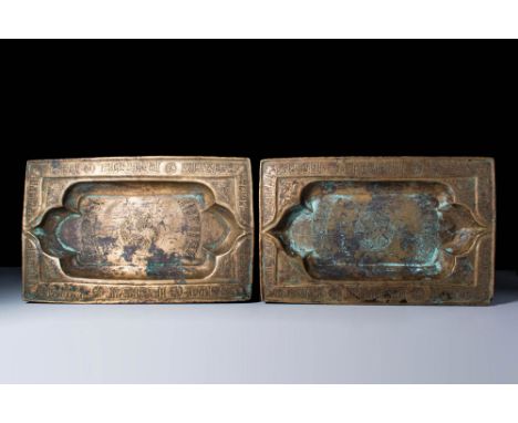 Ca. AD 1100 - 1200.
A pair of bronze seljuk trays of rectangular form, bordered with Kufic calligraphy on the rim and circula