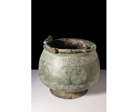 Ca. 12th - 13th century AD.
Metal buckets were common in pre-Islamic cultures of the Middle East and it is likely that their 