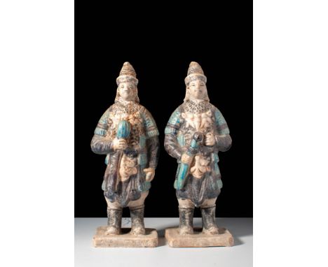 Ming Dynasty, Ca. AD 1368-1644.
A pair of terracotta warriors dressed in full armour. The soldiers stand in a commanding pose