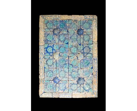 Ca. Early 14th century AD .A wall panel of rectangular form painted with cobalt-blue and turquoise, the surface moulded with 