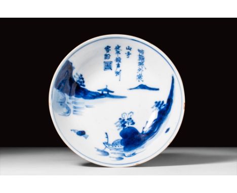 Tianqi period, Ming Dynasty, Ca. AD 1621-1627.A blue and white landscape dish. The scene comes from the Tang dynasty poem, Ni