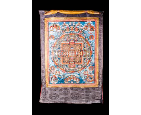 Ca. 18th - 19th century AD.
A Tibetan Mandala tangka. Around the central mandala, there are several Buddha figures and deitie