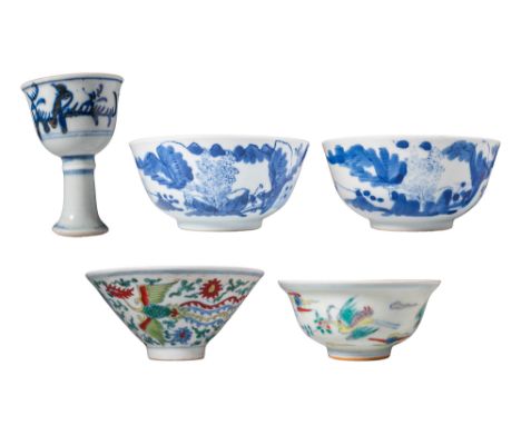 Ca. 20th century AD.A group of five porcelain vessels, including one underglaze blue and white stemmed-foot cup, two undergla