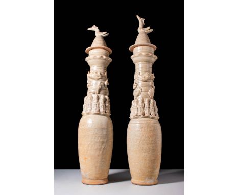 Song Dynasty, Ca. AD 960 - 1279 or later.A pair of ceramic urns decorated with moulded applied turtles, dogs and cockerels, a