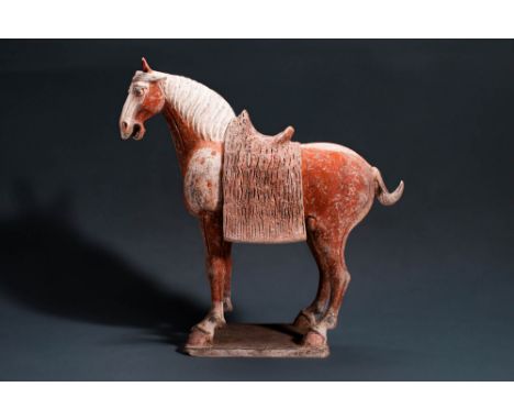 Tang Dynasty, Ca. AD 618-907.
A terracotta horse. The standing figure is painted with red pigments, with the mane kept white.