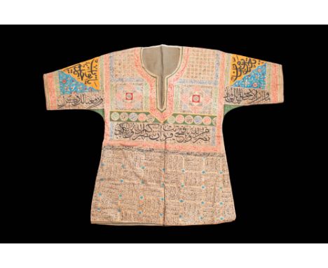 Ca. 20th century AD .
A talismanic shirt, or Jama, with Arabic inscriptions on both front and back in Naskh/Thuluth script, s