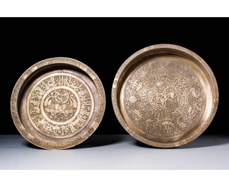 Ca. AD 1100 - 1200.
A pair of engraved bronze dishes with inlay, of shallow form with its walls sloping inwards towards the e