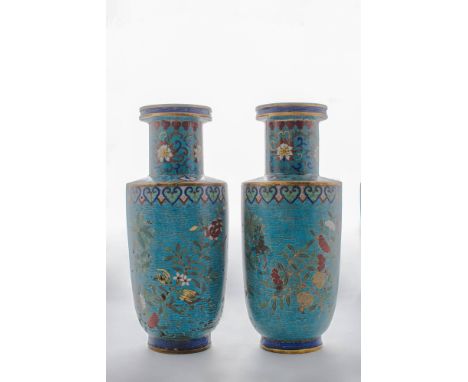 Qing Dynasty, Ca. AD 1644 - 1911.A pair of cloisonné enamel rouleau vases. The cylindrical bodies are decorated with peonies 