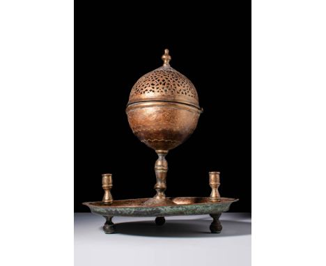 Ca. 17th century AD .
A copper incense burner (Tombak) of ovoid form with hinged cover, the circular base standing on three f