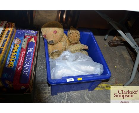 Three vintage teddy bears and a chefs uniform