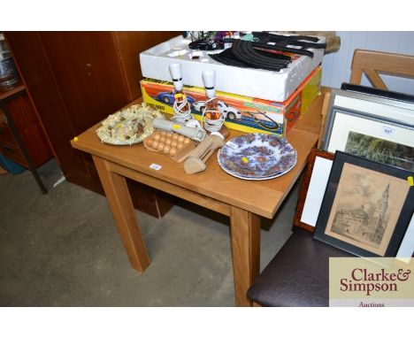 A modern light wood extending kitchen table