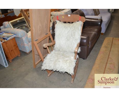 An elm stick back rocking chair 