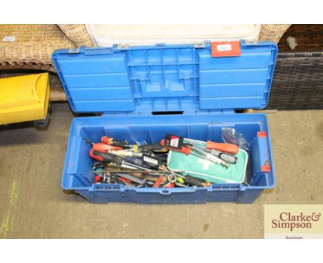 A toolbox with a quantity of hand tools and first aid kit