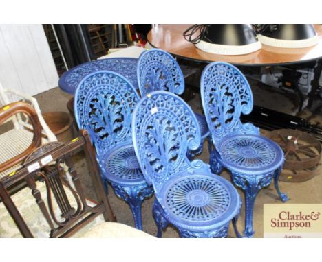 Four painted ornate pattern bistro style garden chairs and table