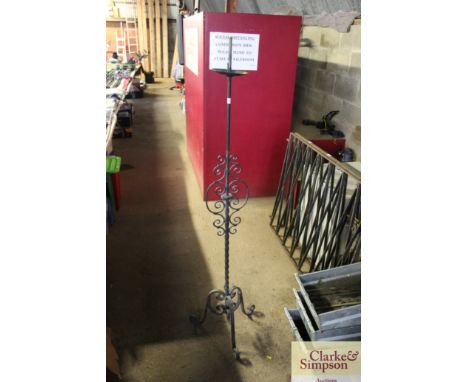 A wrought iron lamp base