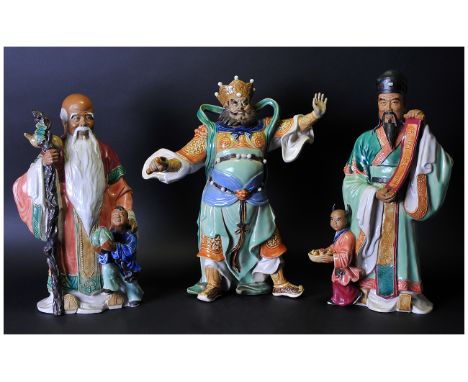 Chinese Glazed Stoneware Figures, One Depicting a Sage with a Child Holding a Peach, 14 Inches High, A Scholar Holding a Scro