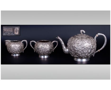 Wang Hing & Company Chinese Export 3 Piece Tea Service cira 1890 Of Globular Form With Embossed Prunus Design On A Slightly M