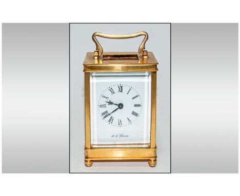 English Good Quality 8 Day Brass Carriage Clock with visible escapement. White porcelain dial. Key wind. 6'' in height.