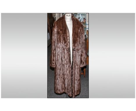 Ladies Brown Three Quarter Length Ermine Coat, fully lined. Hook & Loop fastening with inner tie. Approximate size 14.
