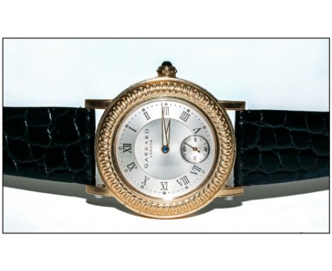 Gents 18ct Gold Cased Garrard Wristwatch, with visable 21ct white gold rotor and a high grade movement with switching rocker 