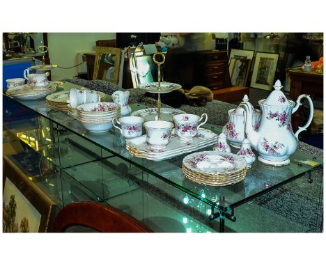 Royal Albert' 'Lavender Rose' Part Dinner Set comprising coffee pot, teapot, two cake stands, dinner plates, cups, saucers, m