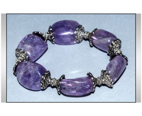Amethyst Large Bead Bracelet, smooth, ovoid, large amethysts with decorative bead ends and small rondelle spacers 
