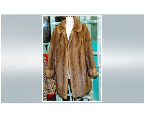 Ladies Light Brown Mink Jacket, fully lined. Button Cuff Sleeves. Collar With Revers. Inner Satin tie. slit pockets. Approxim