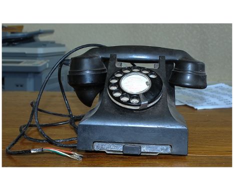 Vintage Black Bakelite Telephone with sliding index tray.