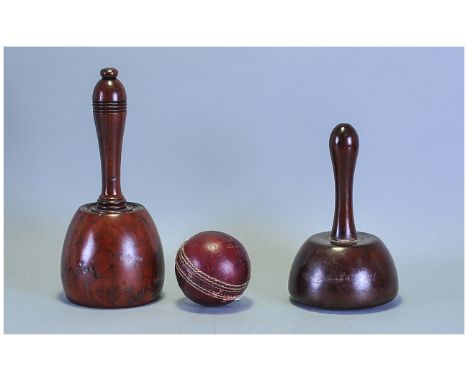 Two Antique Mahogany Mallets. together with a vintage leather cricket ball