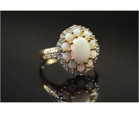 9ct Gold Diamond Dress Ring, Set With A Central Opal Surrounded By Further Opal Between Diamond Spacers And Shoulders, Fully 