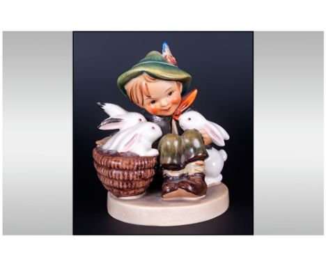Hummel Figure Little Boy With Rabbits, Marked M.J.Hummel. 4'' in height.