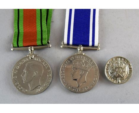 A WW2 Police Long Service & Good Conduct Medal named to Constable Harold C Chapman with his unnamed WW2 Defence Medal and For