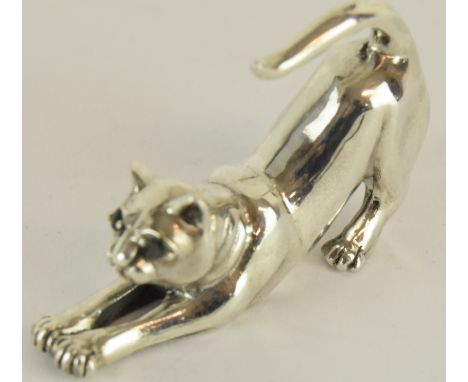 a good solid cast silver cat figure with emerald eyes