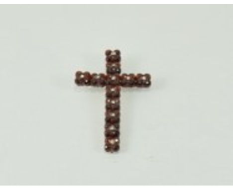 A garnet silver cross 6x4cm