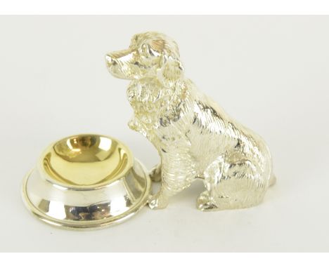 a silver plated salt container in the form of a dog