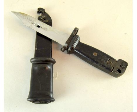 A Kalashnikov bayonet in its scabbard (34cms length overall)