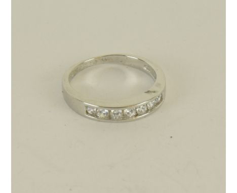 a silver and Cz half eternity ring