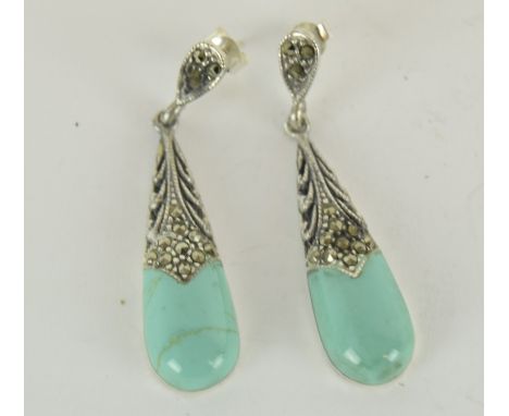 a pair of silver and turquoise set art deco style earrings