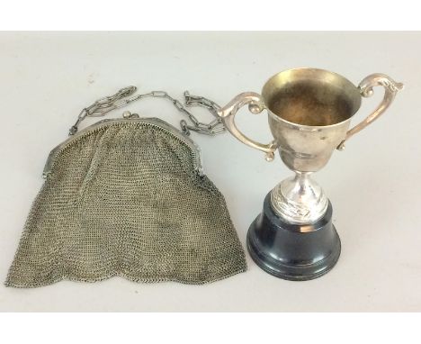 Silver ladies mesh purse and a trophy cup