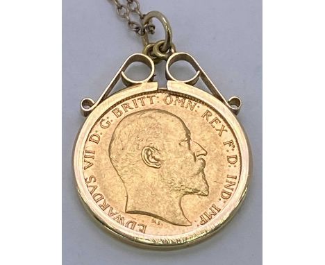 EDWARD VII 1910 GOLD HALF SOVEREIGN - with a 9ct mount and chain, 6.7grms
