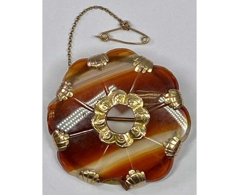 AGATE BROOCH -  shaped edge with safety chain, having 9ct mounts and centre, 12.5grms gross